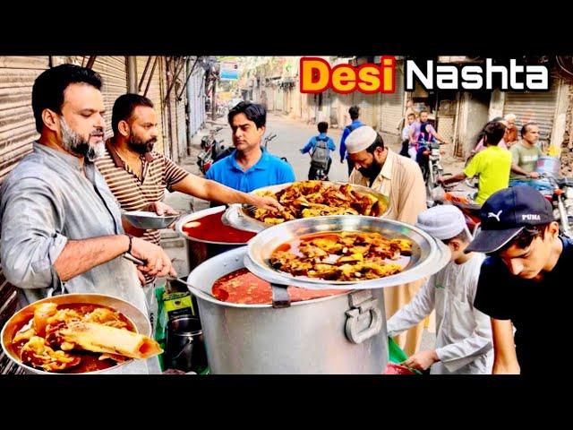 100/- Rs-EXPLORING PAKISTANI PUNJABI DESI NASHTA | BEST STREET FOOD IN LAHORE | BONG PAYE | CHANAY