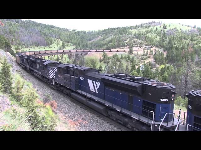 SD70MAC led coal train climbs Mullan Pass