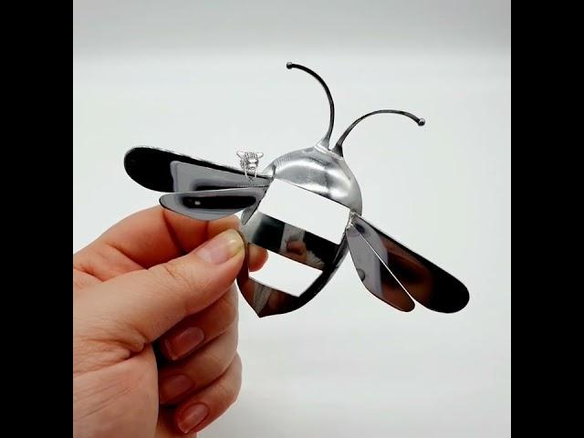A Bee hand-crafted from recycled cutlery. 
