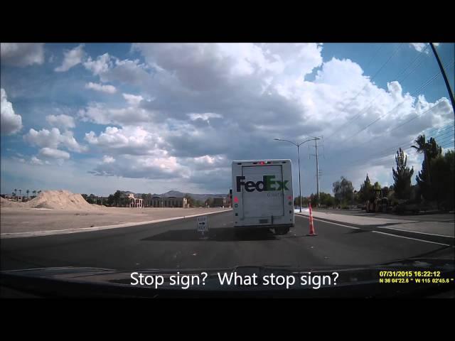 FedEx truck runs stop sign right in front of me