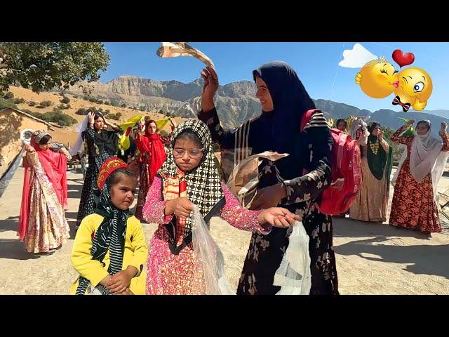 Nomadic wedding: Akram's girls dance in the circle of nomadic girls