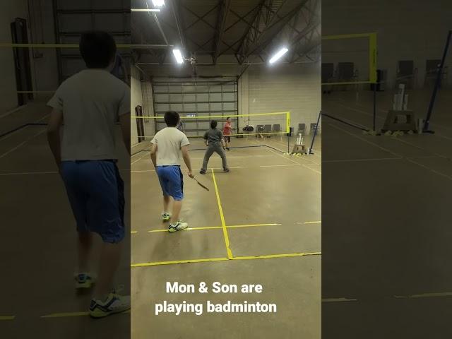 Mom and son are playing badminton tonight