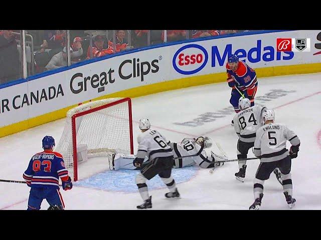 Cam Talbot robs Leon Draisaitl with a glove save.