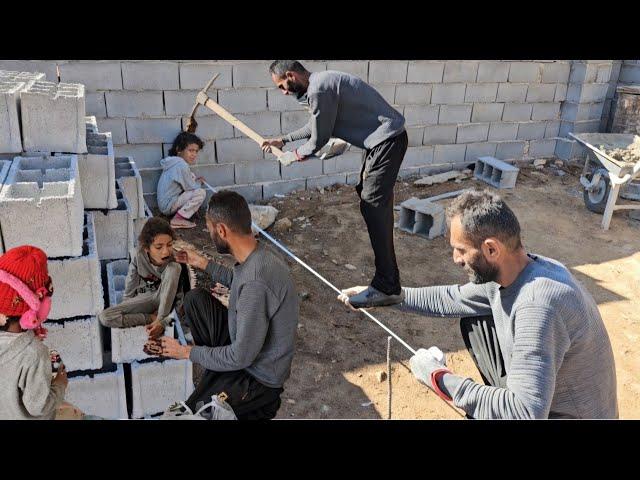 Mustafa took care of his sick daughters and built a room for the goats.