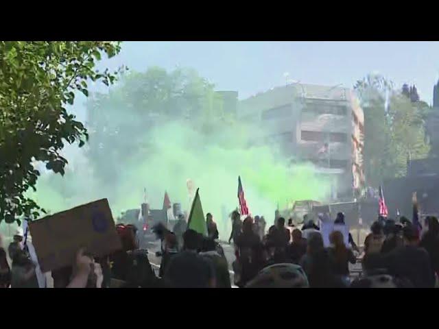 Tear gas deployed after hundreds of protesters gather outside Portland ICE facility