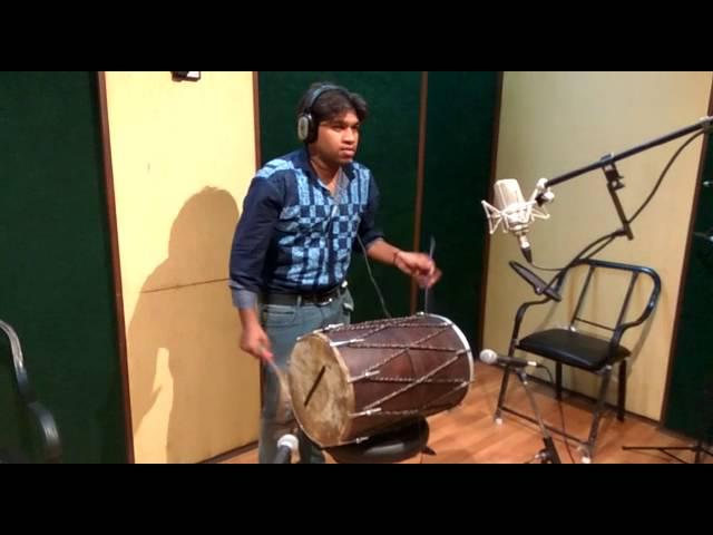 Rahul Bhagania playing dhol in studio