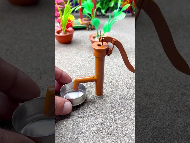 Mini handpump project i watered plants  #waterpump #290