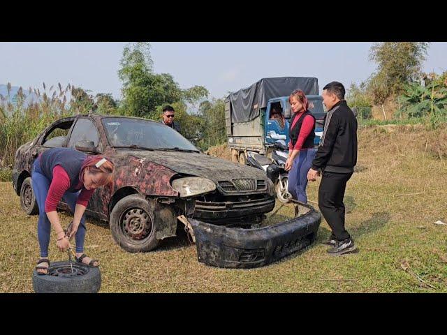 The girl maintains and restores old cars that have been abandoned for a long time.