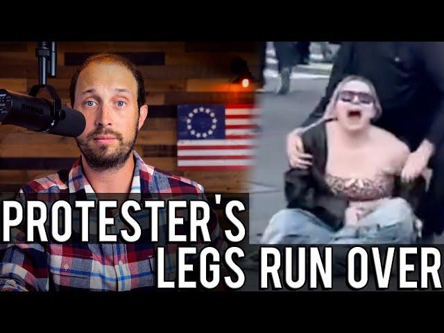 LA Protester Blocks Car, Gets Her Legs Run Over | An Unfortunate Physics Lesson