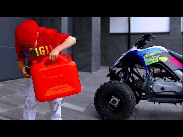 Boy Filling Up Gas Tank of Off-Road Vehicle