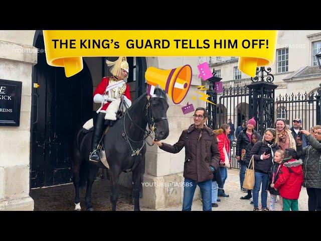 THE KING’S GUARD TELLS HIM OFF FOR THIS POSE!