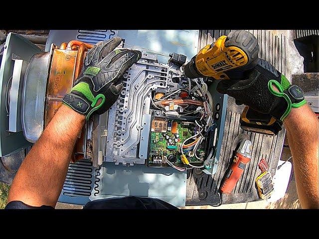 Taking Apart A Tankless Water Heater For Scrap