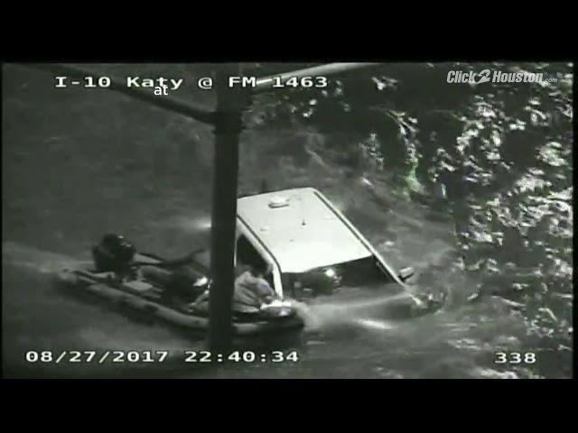 Dramatic rescue of stranded driver in flooded car in Houston area