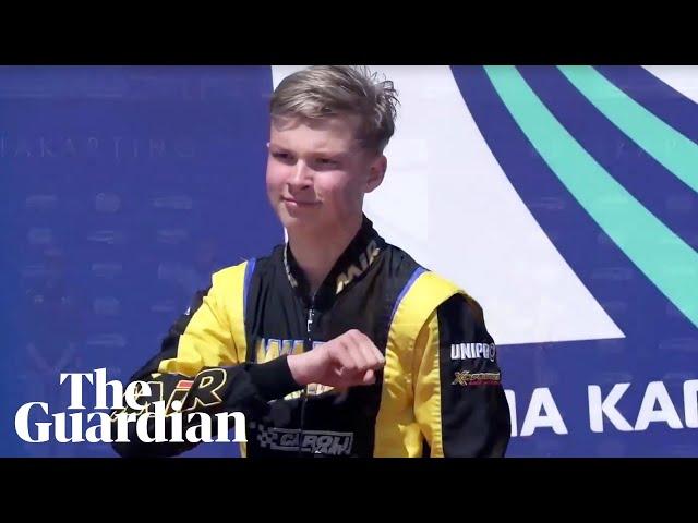 Russian karting champion apologises after appearing to make Nazi salute on podium