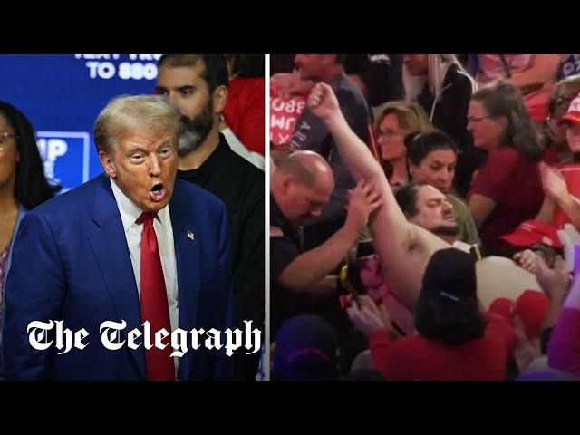 Trump dances after two supporters collapse at bizarre town hall