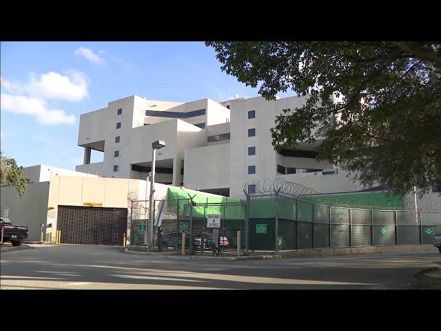 Viral video shows line of police cars waiting to drop off arrestees at Miami-Dade jail