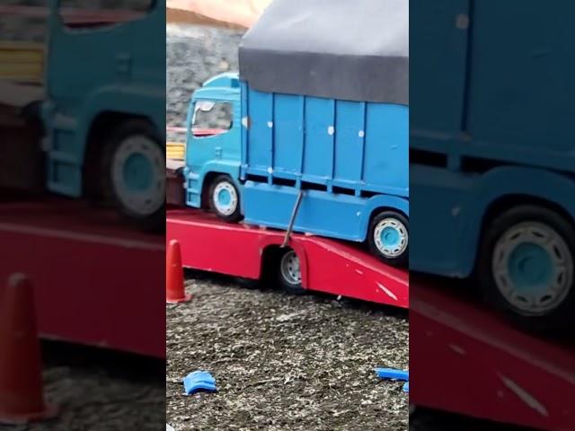 rc towing muat truk laka