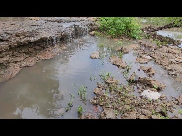 Digging Oklahoma for old bottles  and relics Exposes all kinds of history  in the mud Cork tops