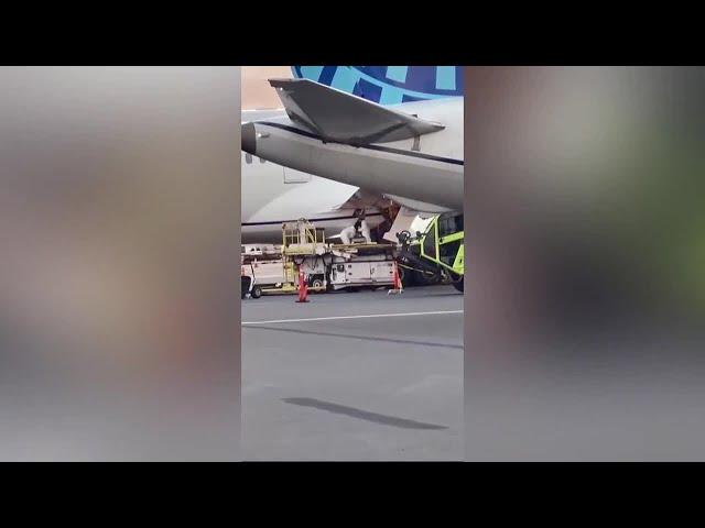 Body discovered in wheel well of plane at Maui airport