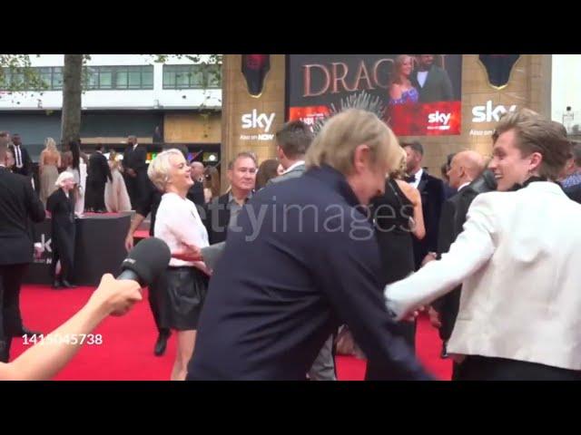 Funny Rhys Ifans, greets Tom Glynn Carney and Ewan Mitchell at the 'House Of The Dragon' premiere 