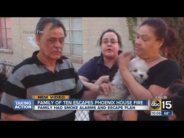 Family of ten, dog escape Phoenix house fire