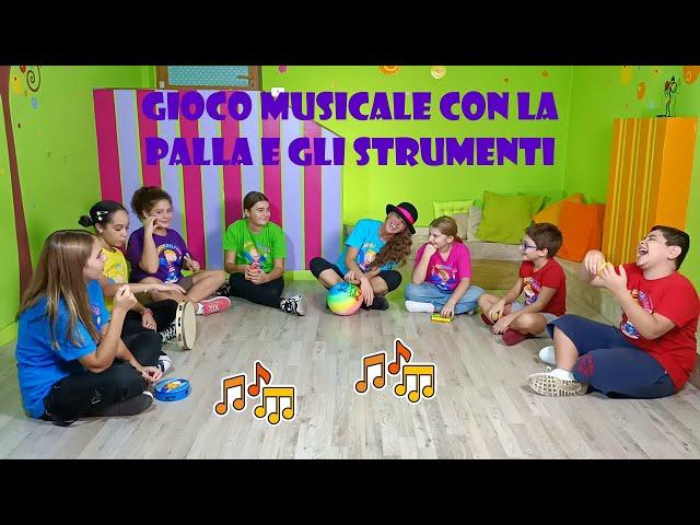 GIOCO MUSICALE CON LA PALLA E GLI STRUMENTI A PERCUSSIONE PER BAMBINI DELL'INFANZIA E DELLA PRIMARIA