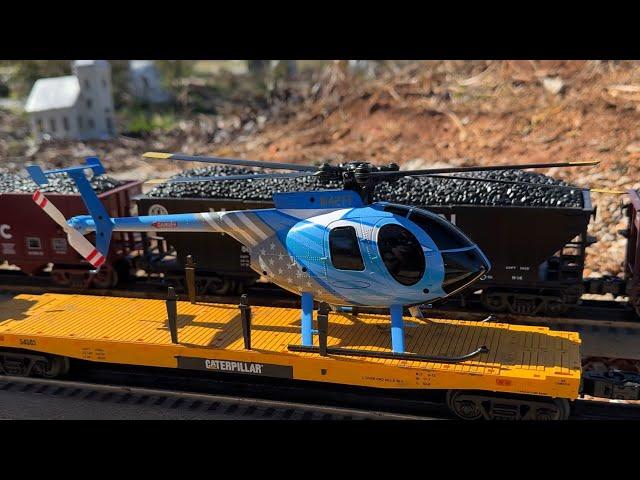 Cleetus Mcfarlands consuela takes a ride on the worlds largest lionel garden railway