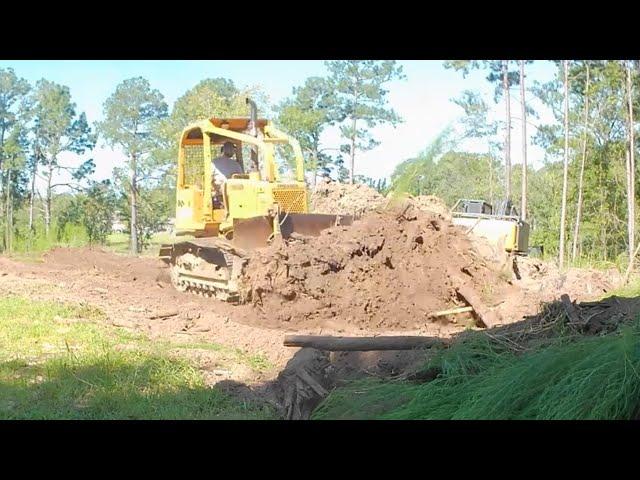 Moving a MOUNTAIN of Topsoil for the BIG DAM project!