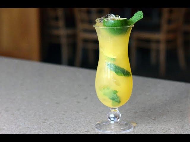 Sandy shakes up a bright Mango Mojito just in time for Summer!