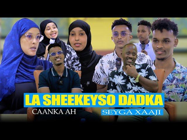 LA SHEEKEYSO QOFKA CAANKA AH WAXAA MARTI KU AH SAYGA XAAJI.MAXAA KALA QABSADAY ASIGA IYO TEAMKA....