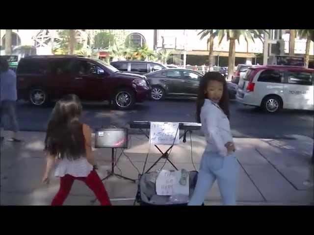 FAMOUS TV STAR ON VACATION DANCES WITH 10 YEAR OLD STREET PERFORMER AND GETS PUNKED!