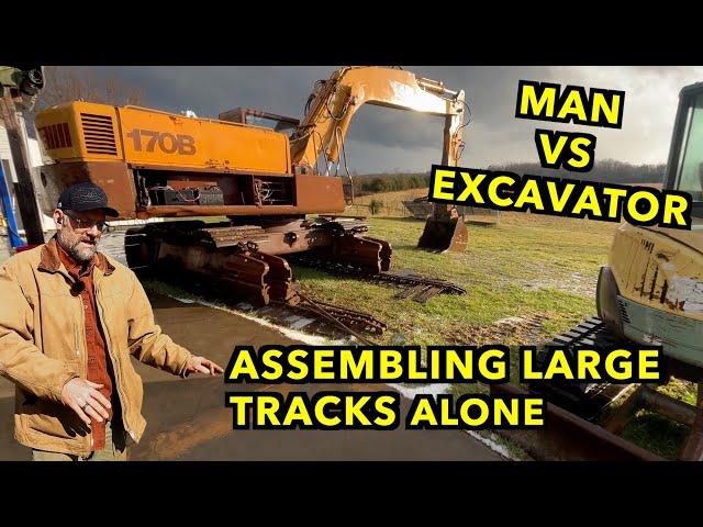 Finishing the Track Adjusters on Large Marge.  Case 170B Excavator.