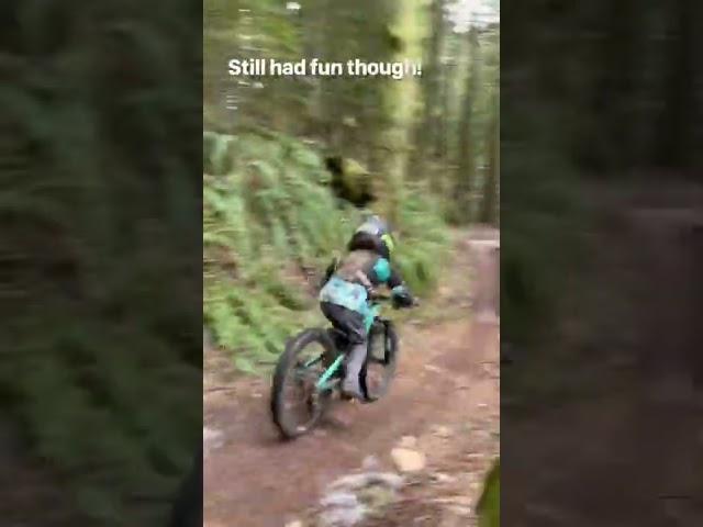 4 year old m Mountain biking on snow covered trails 