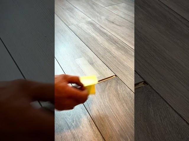 How to fix laminate flooring gaps . #diy #lifehacks  #tips #shortswithcamilla #trendingwithshorts