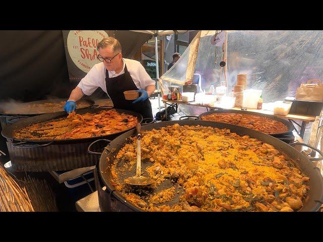 Big Spanish Seafood Paella and Noodles Cooked by a Spaniard from Valencia. London Street Food