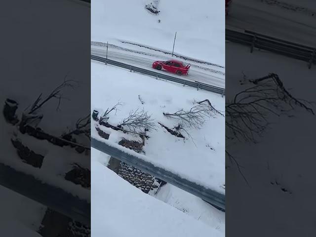 Mitsubishi Lancer Evo VI drift in the snow