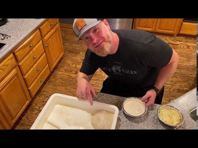 Removing and stretching pizza dough