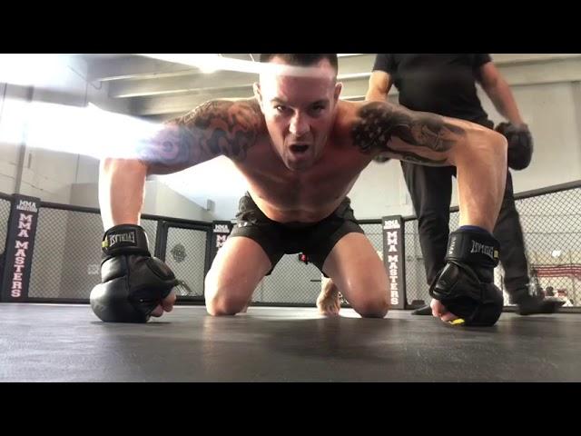 Trainer ORLANDO CUELLAR with America’s UFC Champ Colby Covington