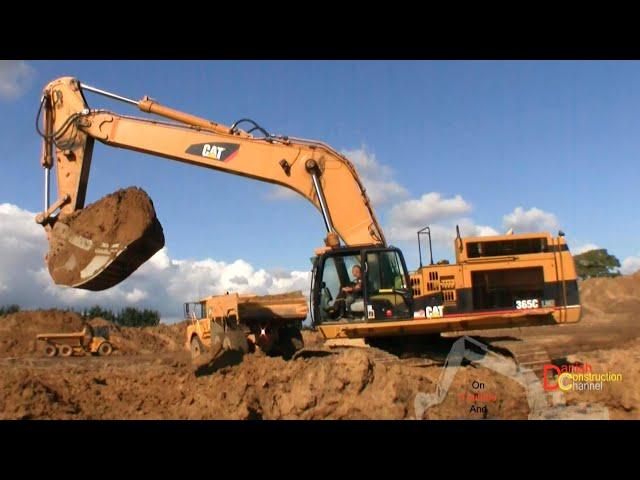 Cat 365 Long Reach Excavator Loading Volvo And Hydrema Dumpers