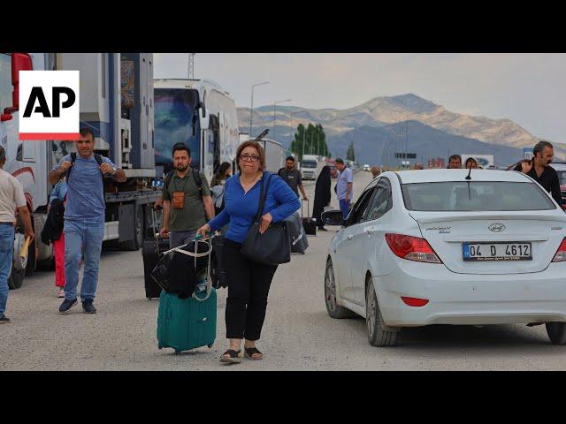 Iran residents cross the border into Turkey as Israel strikes continue