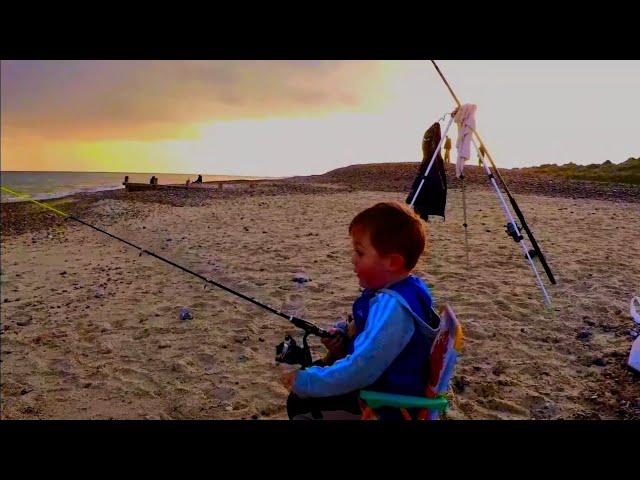 summer beach fishing at littlehampton. watching the sunset with my son 