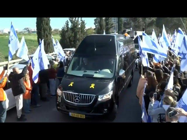 Crowds line the streets for funeral procession of Bibas family | AFP