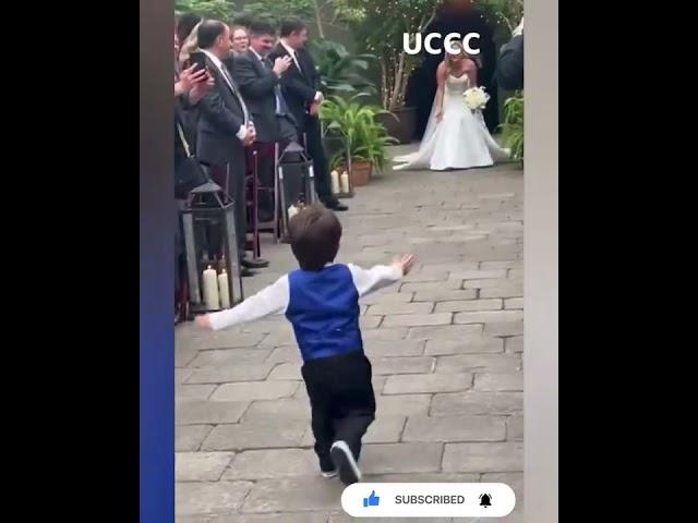 Toddler steals the show at mom's wedding , he screams with glee as she walks down the aisle #shorts