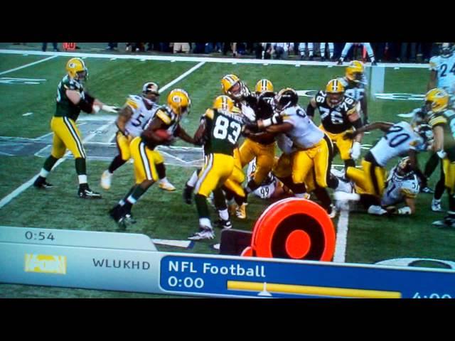 Packers' Tom Crabtree throws down Steelers defender during Super Bowl XLV