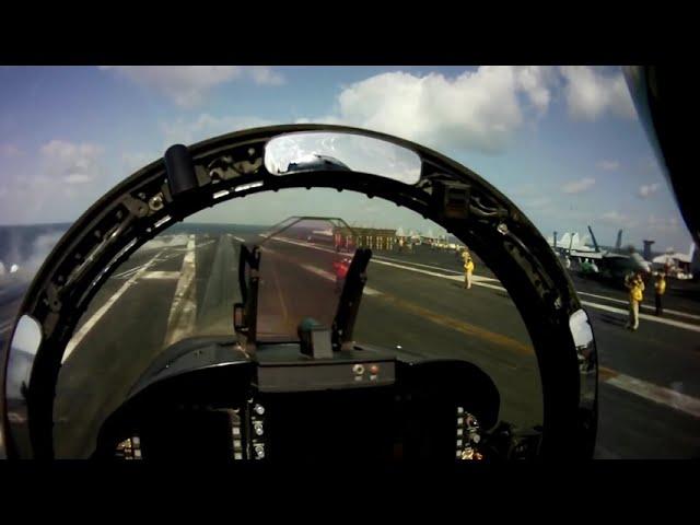 Inside an F/A-18C Hornet launching from the aircraft carrier USS Abraham Lincoln (CVN 72).