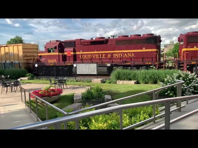 Train speeding really close to a building!