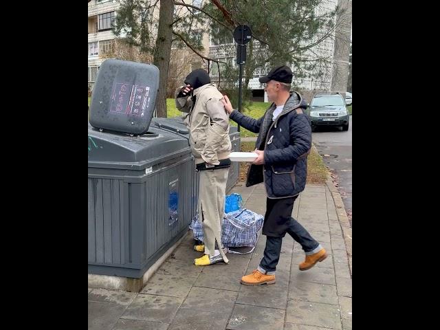 A tender-hearted chef offers a pizza to a homeless man