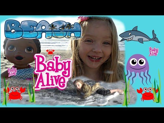 BABY ALIVE has a FUN DAY at the BEACH! SWALLOWED by the OCEAN. The Lilly and Mommy Show! FUNNY KIDS