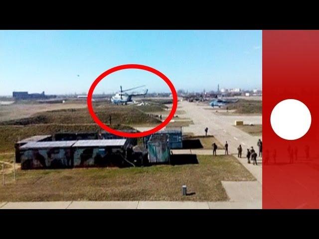 Video: Ukrainian pilots escape with aircraft as troops 'take over' air base