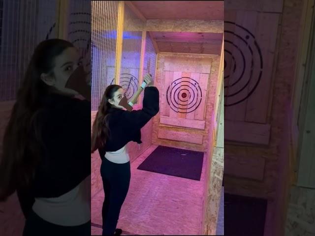 Girl is attempting axe throwing and it doesn't go well!